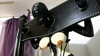 Lesbian Teen Gets Tied Up And Fucked In Rubber Suit